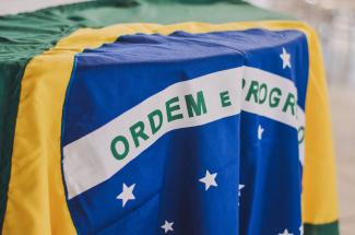 Brazillian flag by Rafaela Biazi courtesy of Unsplash.