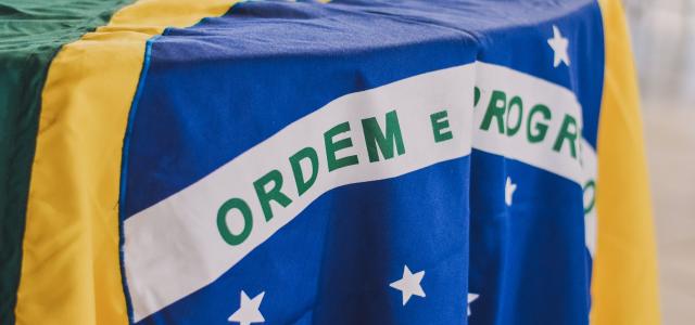 Brazillian flag by Rafaela Biazi courtesy of Unsplash.